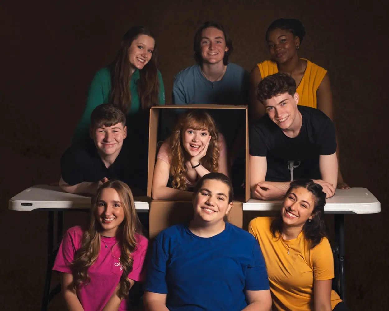 A group dressed in coordinated solid colors from one palette